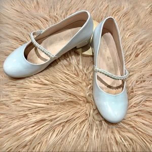 White patent faux leather Mary Jane pump